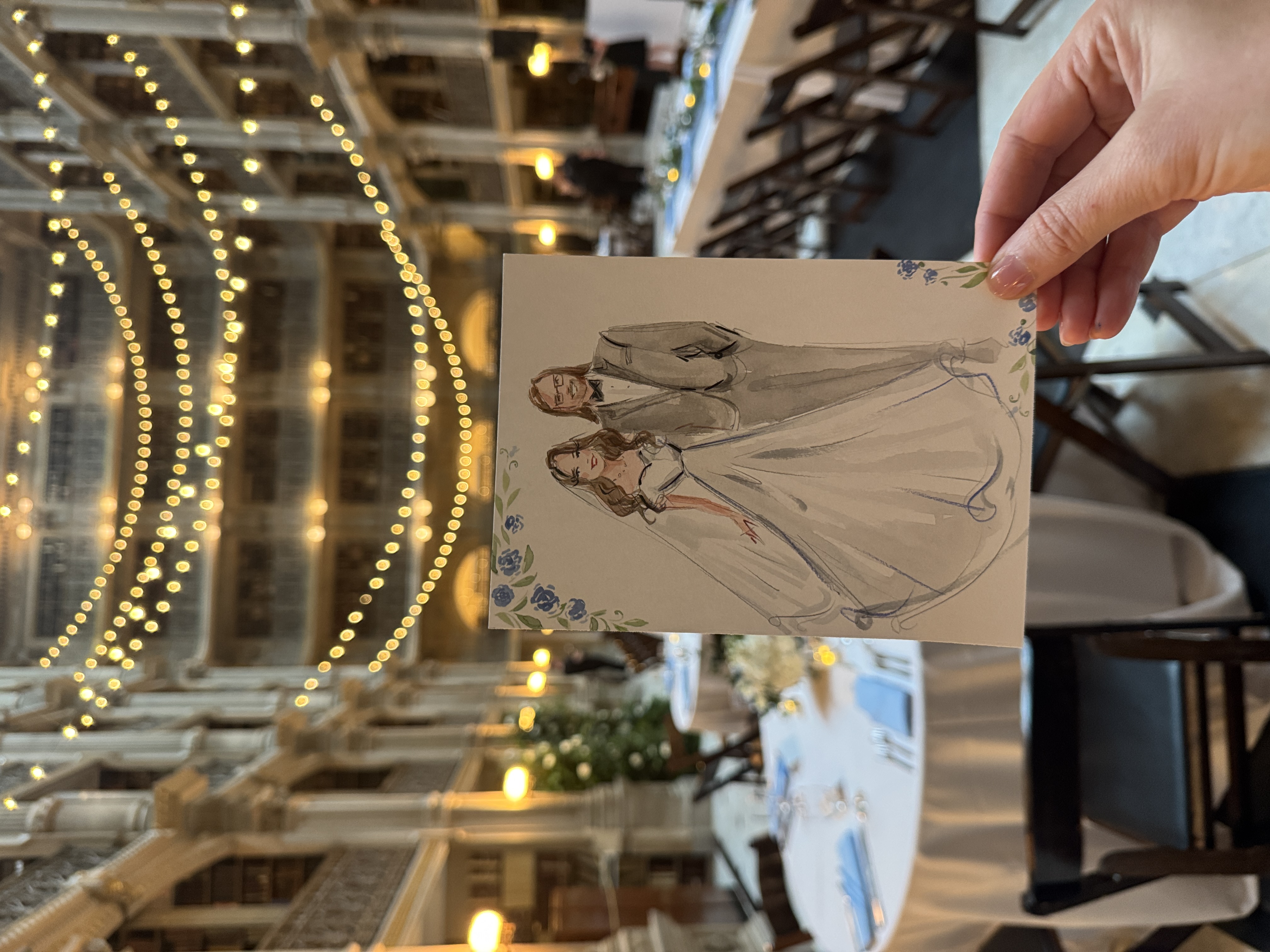 Elena Fay creating a live painting during an event